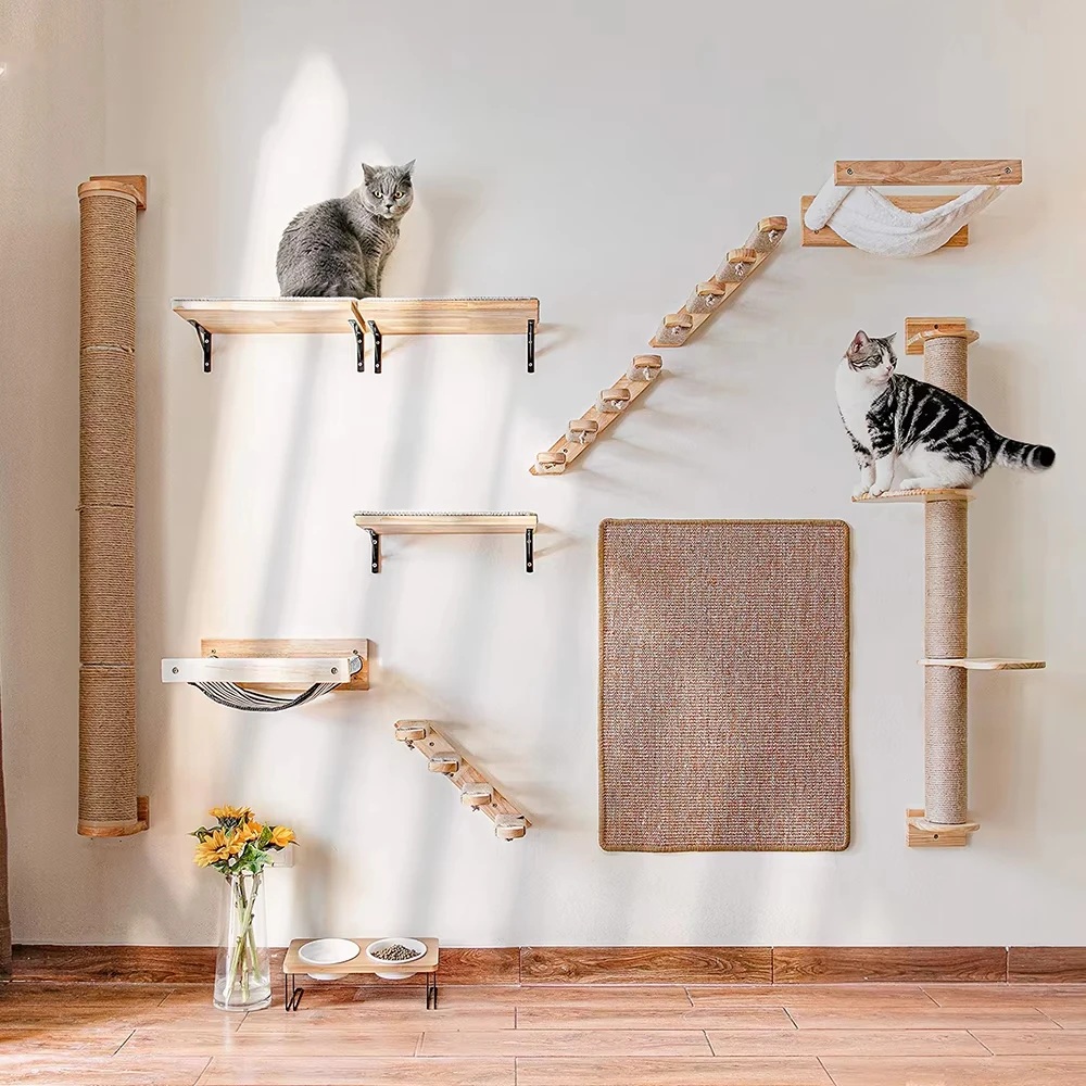 Four wooden cat steps mounted on a wall with a sisal wrapped scratching post